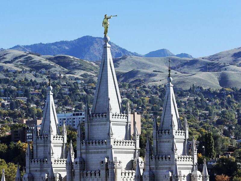 FILE - The Salt Lake Temple and Angel Moroni in Salt Lake City, Monday, Oct. 13, 2014. A 21-year-old LDS missionary died in Samoa after he was struck by a vehicle while walking with his companion on Sunday, Nov. 19, 2017.