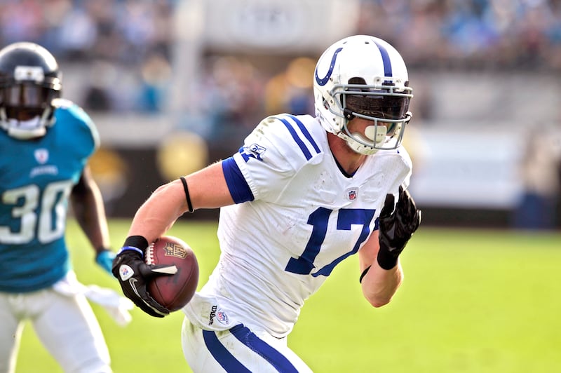Indianapolis Colts wide receiver Austin Collie (17) scores a touchdown during a game against the Jacksonville Jaguars on Jan. 1, 2012.