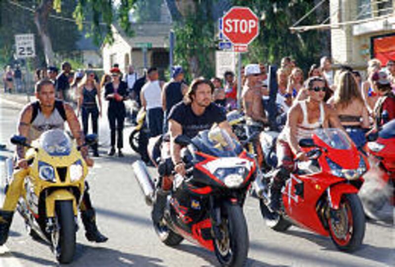Jay Hernandez, left, Martin Henderson and Will Yun-Lee ride into town in "Torque," a biker movie that's so bad it's almost entertaining.