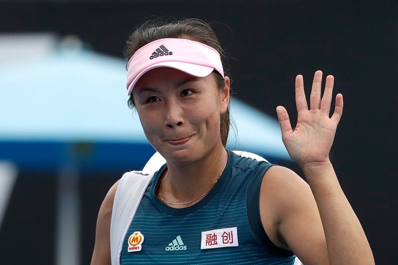 China’s Peng Shuai waves after losing to Eugenie Bouchard.