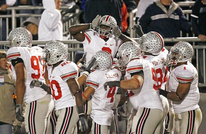 Cornerback Malcom Jenkins (2) celebrates with teammates after returning an interception for a touchdown on Saturday against Penn State.