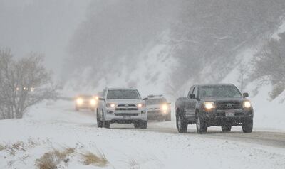 Motorists travel through the snow in Little Cottonwood Canyon on Tuesday, Feb. 5, 2019.