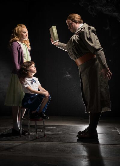 Bre Welch as Miss Honey, left, Lucy White as Matilda and Aaron Ford as Miss Agatha Trunchbull in the Monday/Wednesday/Friday cast of Hale Centre Theatre's "Matilda."