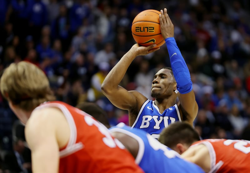 BYU’s guard Rudi Williams puts up a free throw as BYU and Utah play at the Marriott Center in Provo on Dec. 17, 2022.