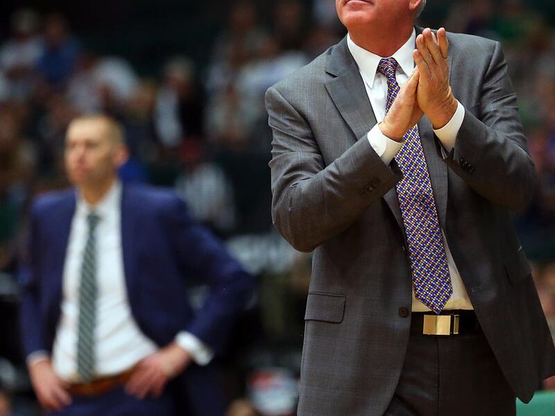 BYU head coach Dave Rose claps his hands as UVU and BYU play at the UCCU center at UVU in Orem Utah on Wednesday, Nov. 29, 2017. BYU won 85-58.