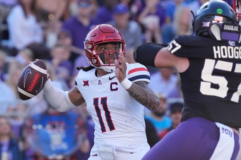 Arizona quarterback Noah Fifita (11) looks to pass during game against TCU Saturday, Nov. 23, 2024, in Fort Worth, Texas.