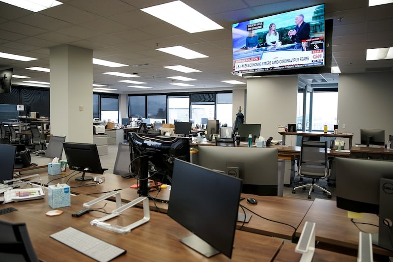 A Deseret News newsroom in Salt Lake City is nearly empty on Friday, March 13, 2020, after employees were advised to work from home if possible. 