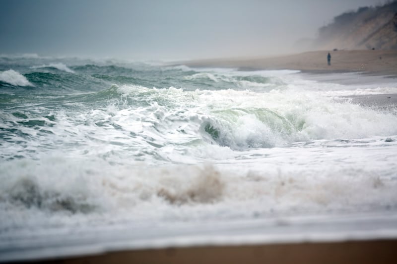Waves crash onto Marconi Beach, part of Cape Cod National Seashore in Wellfleet, Mass.