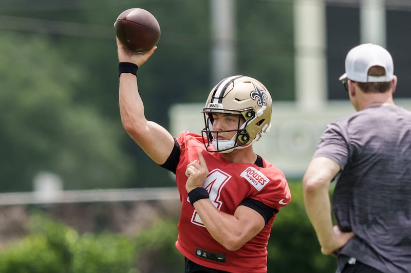New Orleans Saints quarterback Zach Wilson (4) throws during practice in Metairie, La., Wednesday, June 17, 2026.