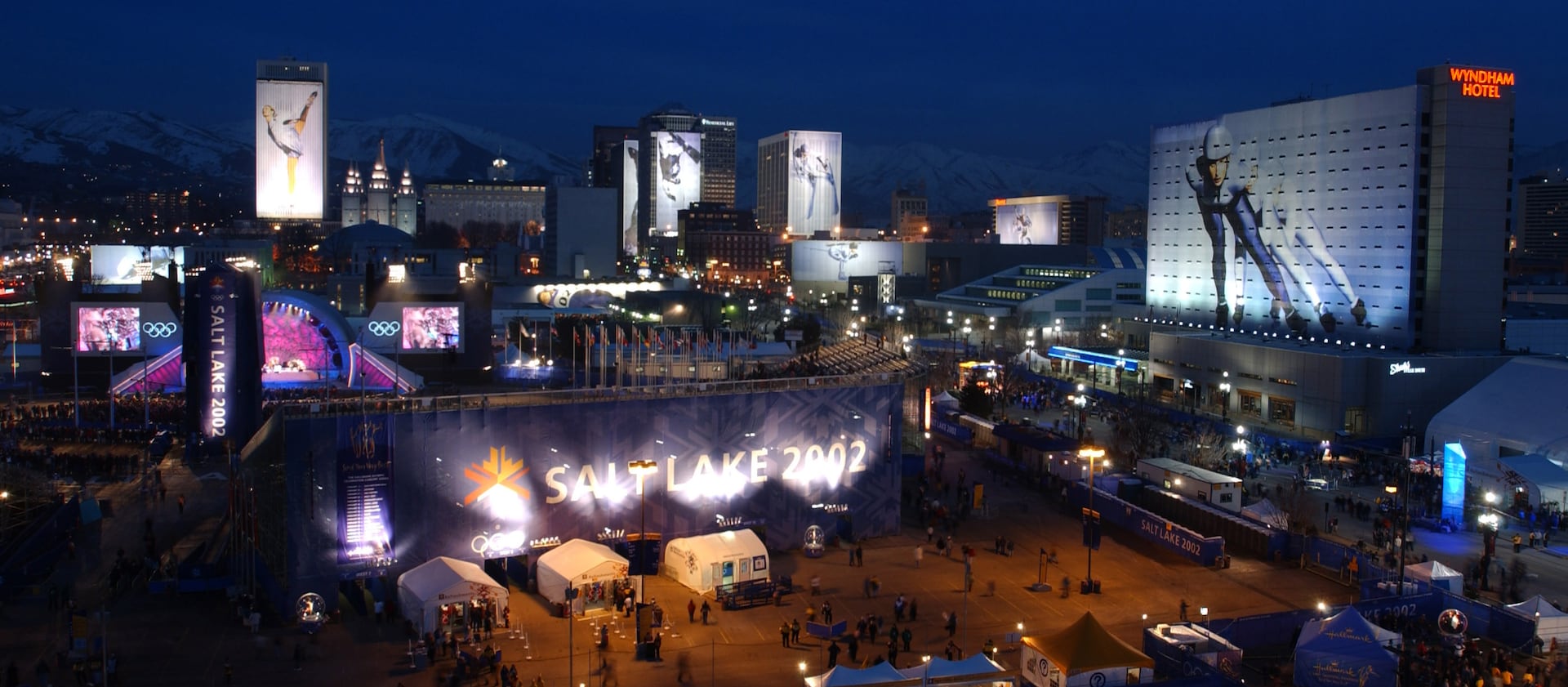 Downtown Salt Lake City is illuminated with Olympic excitement in 2002.