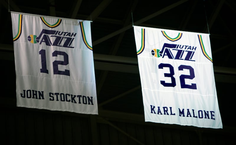 The jersey of former Utah Jazz forward Karl Malone hangs from the rafters at the jersey retirement ceremony Thursday, March 23, 2006, in Salt Lake City.
