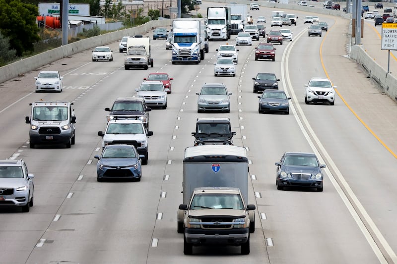 Traffic moves along I-15 during rush hour in Salt Lake City on July 1, 2022.