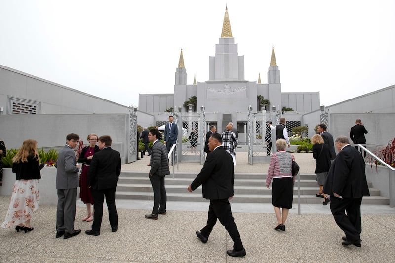 Latter-day Saints enter the Oakland California Temple to hear President Dallin H. Oaks, first counselor in the First Presidency, rededicate the building on Sunday, June 16, 2019.