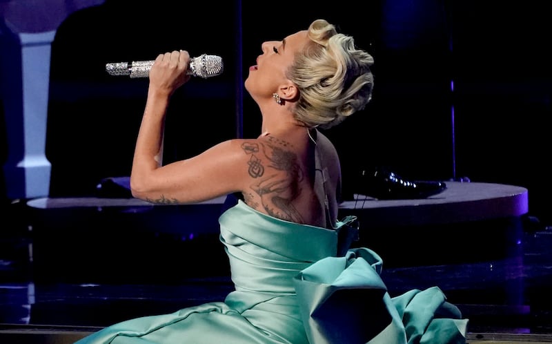 Lady Gaga performs a medley at the 64th Annual Grammy Awards on Sunday, April 3, 2022, in Las Vegas. Lady Gaga will reportedly perform at the 2023 Oscars, where she is nominated for best original song.