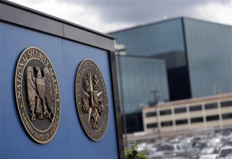 FILE - In this June 6, 2013 file photo National Security Agency plaques are seen at the compound at Fort Meade, Md. The NSA was founded in 1952 but only publicly acknowledged years later, which explains its nickname “No Such Agency.” It includes the Centr