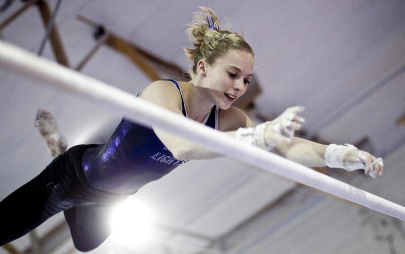 In this Dec. 9, 2011 photo, Mykayla Skinner, 15, practices on the parallel bars in Chandler, Ariz. Mykyayla made the U.S. National Gymnastics team. She hopes to make it to the 2012 Summer Olympics in London.