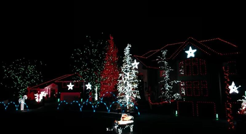 Jon Schmidt controls 500,000 Christmas lights as he plays "I Saw Three Ships" on the piano.