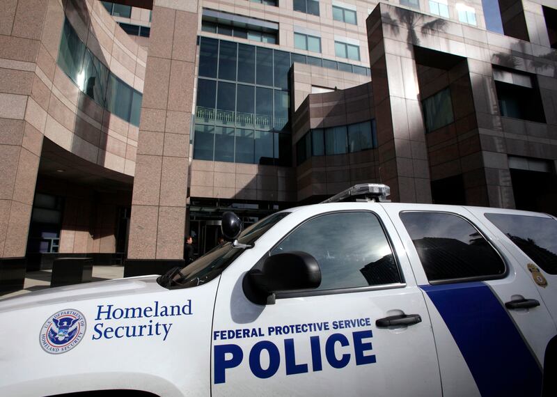 A Homeland Security police car is shown parked outside the Long Beach, Calif., Federal Courthouse Friday Feb. 17, 2012, in Long Beach, Calif.