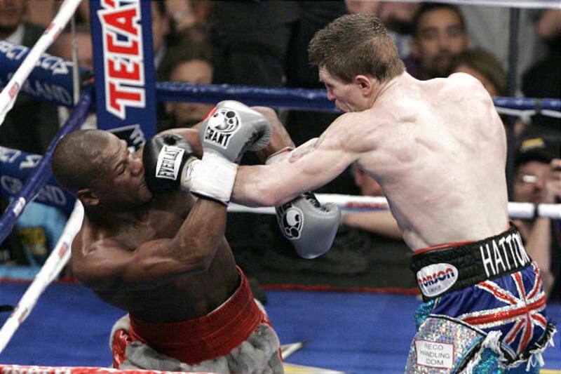 Ricky Hatton, of Great Britain, right, punches Floyd Mayweather Jr. during their WBC welterweight boxing title fight at the MGM Grand hotel-casino in Las Vegas, Saturday.