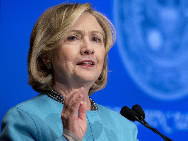 In this Dec. 3, 2014, file photo former Secretary of State Hillary Rodham Clinton speaks in Gaston Hall at Georgetown University in Washington as part of the launch of the inaugural National Action Plan Academy, a joint initiative of the Georgetown Instit