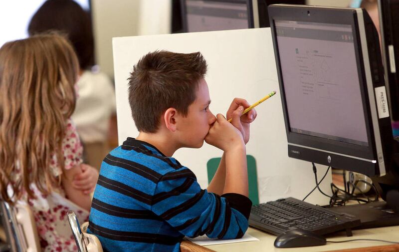 Carson Olsen Elise takes a practice SAGE test at Polk Elementary School in Ogden on Thursday, April 17, 2014.