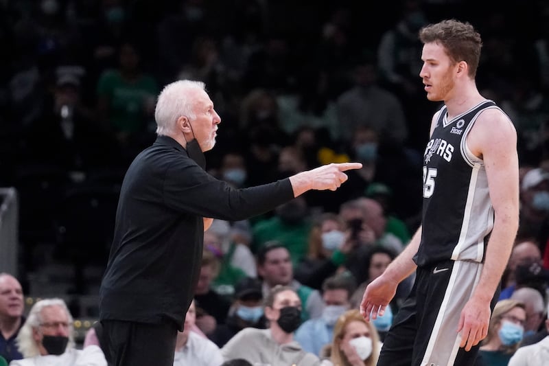 San Antonio Spurs head coach Gregg Popovich gestures toward San Antonio Spurs center Jakob Poeltl during game, Wednesday, Jan. 5, 2022, in Boston. The former Ute holds a debt of gratitude for the legendary coach.