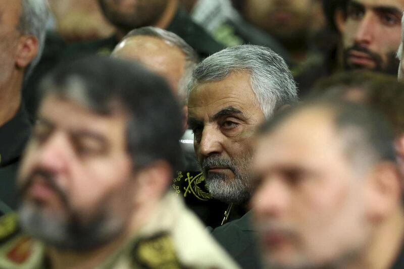 In this Tuesday, Sept. 17, 2013 photo released by an official website of the office of the Iranian supreme leader, then chief of the Quds Force of Iran’s Revolutionary Guard, Ghasem Soleimani, attends a meeting of the commanders of the Revolutionary Guard.