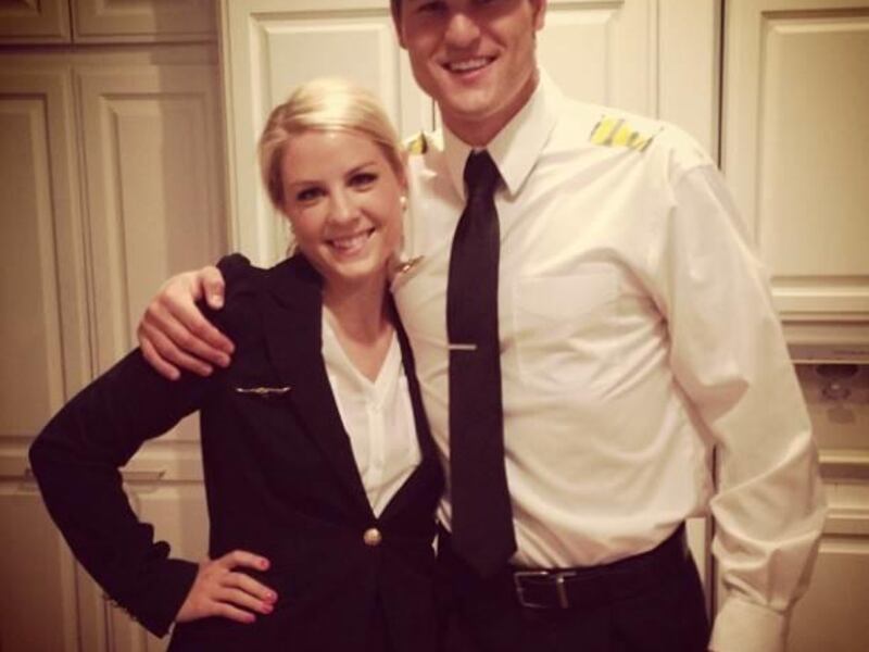 Suzanne Davis, left, and Kyle Calder pose for a picture at a Halloween party.