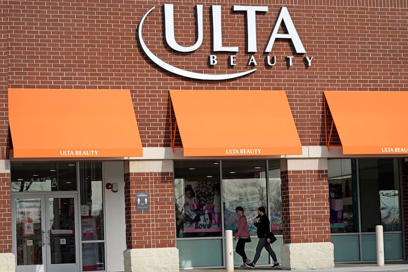 In this 2020 file photo, women walk to an Ulta Beauty store in Schaumburg, Ill.