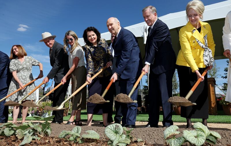 President Russell M. Nelson, center, turns over the first soil for the Heber Valley Utah Temple on Oct. 8, 2022.