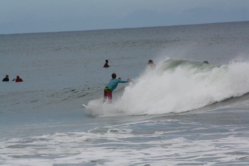 Doyle Nielsen surfs a wave at New Smyrna Beach in Florida on Sept. 9.