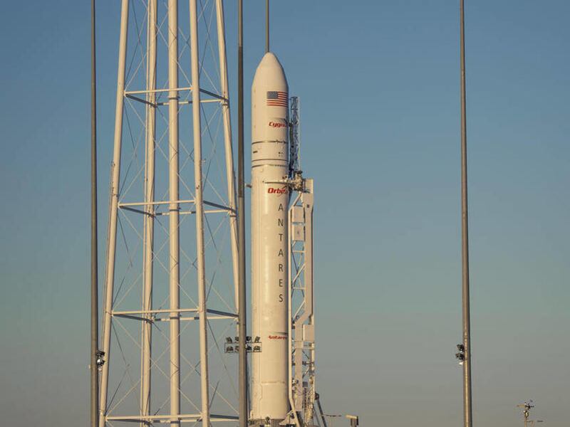 This photo provided by NASA, an Orbital Sciences Corporation Antares rocket sits on launch Pad-0A during sunrise at NASA's Wallops Flight Facility, Wednesday, Jan. 8, 2014, Wallops Island, Va. Orbital Sciences Corp. decided to scrub today"™s launch attemp