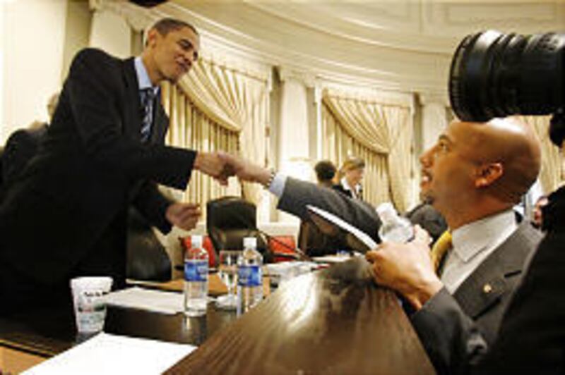 Sen. Barack Obama, D-Ill., left, shakes hands with New Orleans Mayor Ray Nagin after a hearing in New Orleans, La., on recovery issues. Obama jousted with Donald E. Powell, the federal coordinator of Gulf Coast rebuilding, about where aid money was and wh