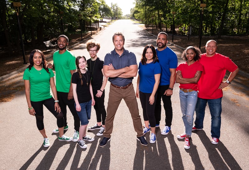 The competitors from season four of "Relative Race" pose for a photo with host Dan Debenham.