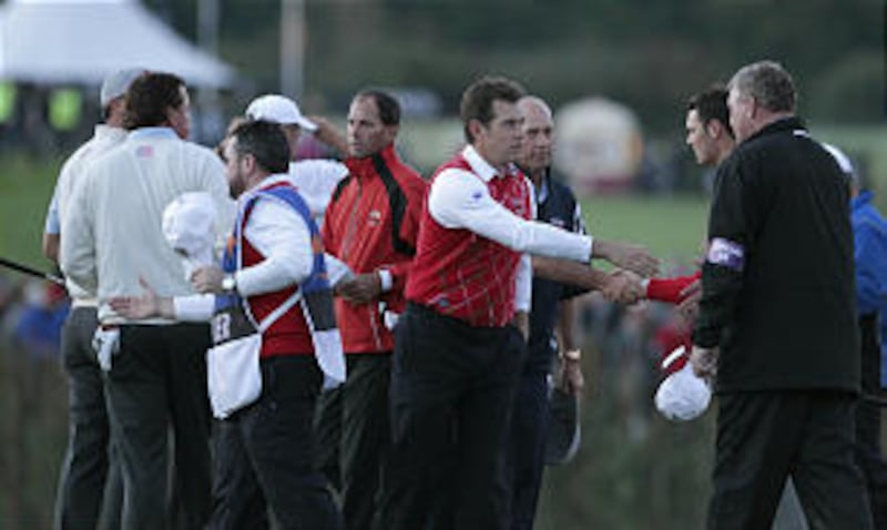 Gilberto Rodriguez Orejuela, left, head of the Cali drug cartel, is escorted to a plane in 2004 in Bogota, Colombia, for extradition to the U.S.
