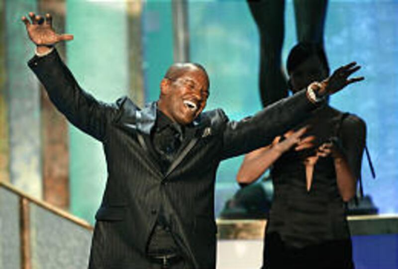 Jamie Foxx, star of "Ray," accepts SAG award for outstanding performance by a male actor in a leading role.