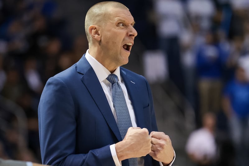 BYU head coach Mark Pope calls out from the bench during the game against the Evansville Aces on Tuesday, Dec. 5, 2023.
