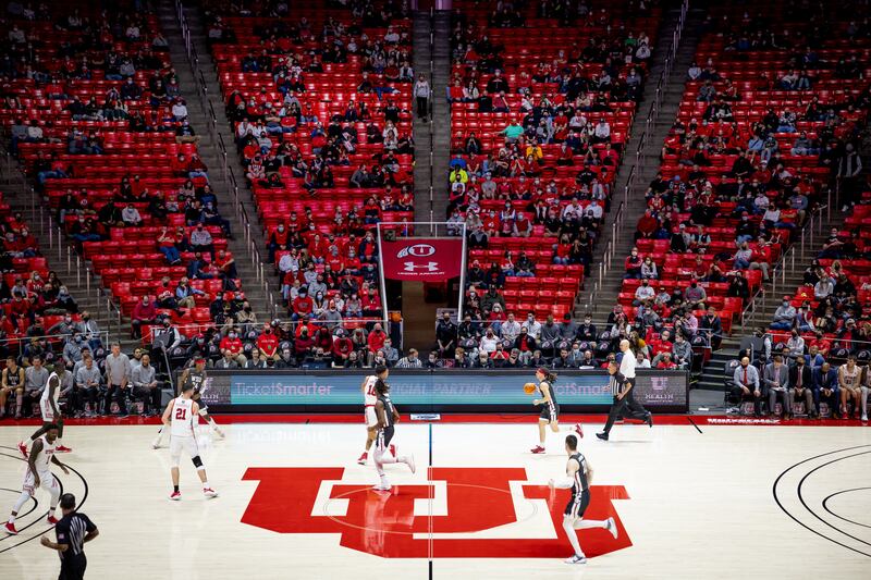 Fans watch the Utah Utes face the Washington State Cougars at the Huntsman Center in Salt Lake City on Saturday, Jan. 8, 2022.