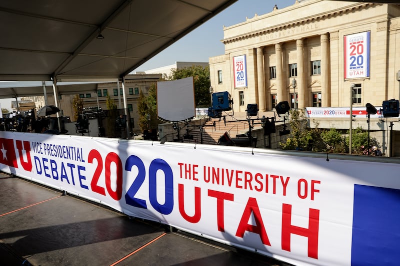 Banners hang outside Kingsbury Hall at the University of Utah in Salt Lake City before the vice presidential debate on Oct. 7, 2020.