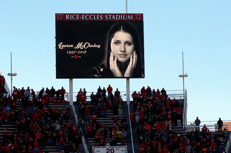 FILE - In this Nov. 10, 2018, file photo, a photograph of University of Utah student and track athlete Lauren McCluskey, who was fatally shot on campus, is projected on the video board before the start of an NCAA college football game between Oregon and U