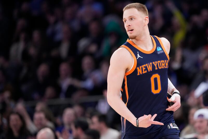 New York Knicks guard Donte DiVincenzo reacts after shooting a 3-point basket