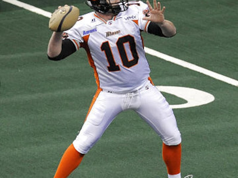 Blaze quarterback Joe Germaine throws a touchdown pass during Friday night's loss to the VooDoo.