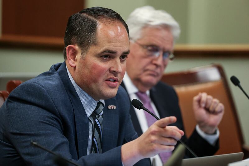 FILE - Rep. Mike McKell, R-Spanish Fork, and Vice Chairman Rep. Lowry Snow, R-Santa Clara, listen to testimony at the Utah State Capitol on Tuesday, Feb. 07, 2017. The House voted Friday to advance a bill that would prohibit so-called "fringe gambling" in