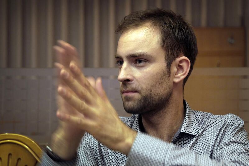 In this June 20, 2015, photo, Robert Grund, Pyongyang representative of the World Federation of the Deaf and the city’s only full-time deaf foreign resident, communicates through the use of sign language during an interview in Pyongyang, North Korea.