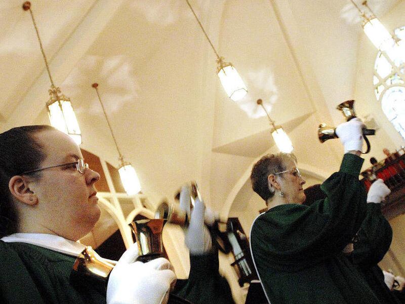 ** FOR USE IN WEEKEND EDITIONS, DEC. 10-12 AND THEREAFTER ** In this Nov. 21, 2010 photo, Caroline Thornburgh, left, and Kathy Haas perform with the Love Handbell Choir at New McKendree United Methodist Church in Jackson, Mo. The Love Handbell Choir _ nam