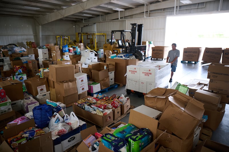 Volunteers collect and sort supplies at the Kerrville, Texas, airport in preparation for distribution to those affected by the severe flooding in central Texas that occurred on July 4, 2025.