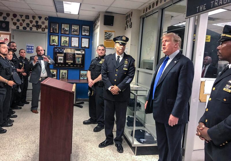 Former President Donald Trump visits the New York Police Department’s 17th police precinct on Saturday, Sept. 11, 2021.