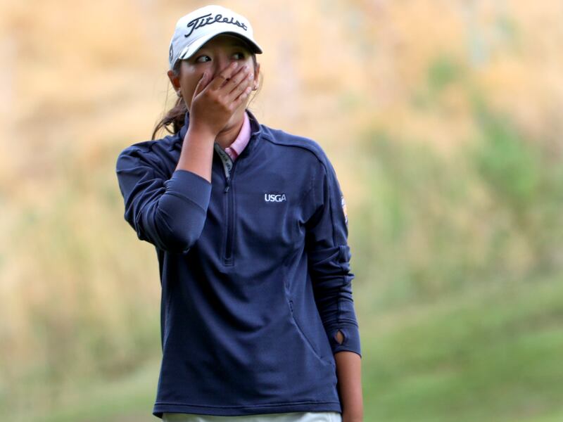 Tess Blair reacts after knocking in a chip shot for par on the ninth hole of the Utah Women’s State Am in 2018.