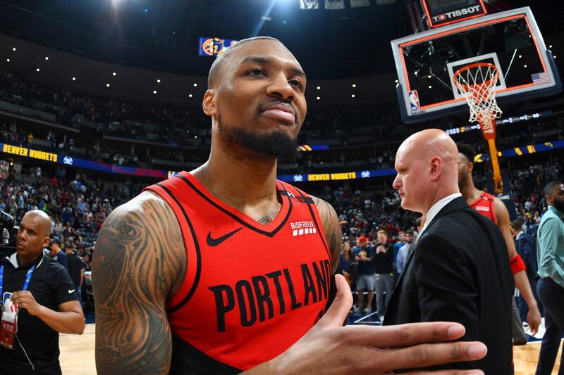 Portland Trail Blazers guard Damian Lillard celebrates after the second half of Game 7 of an NBA basketball second-round playoff series Sunday, May 12, 2019, in Denver. The Trail Blazers won 100-96.