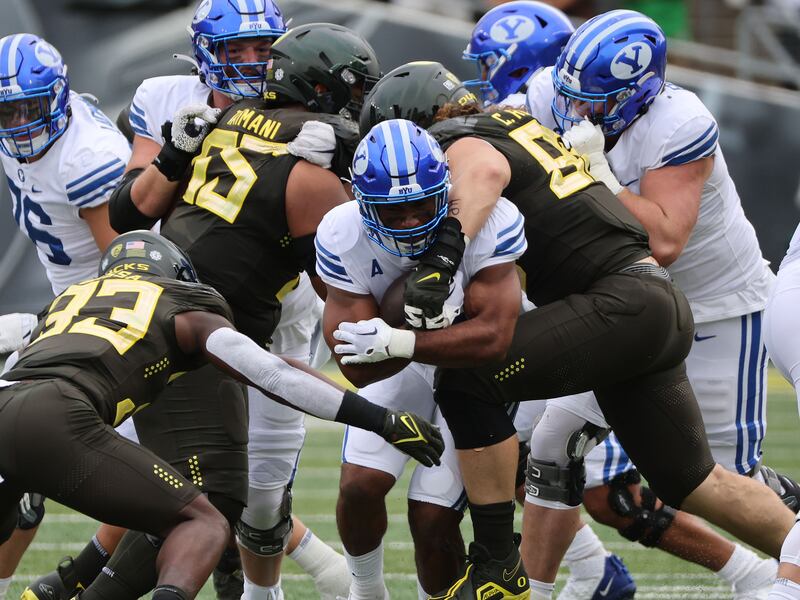 BYU running back Christopher Brooks runs against Oregon at Autzen Stadium in Eugene on Saturday, Sept. 17, 2022.